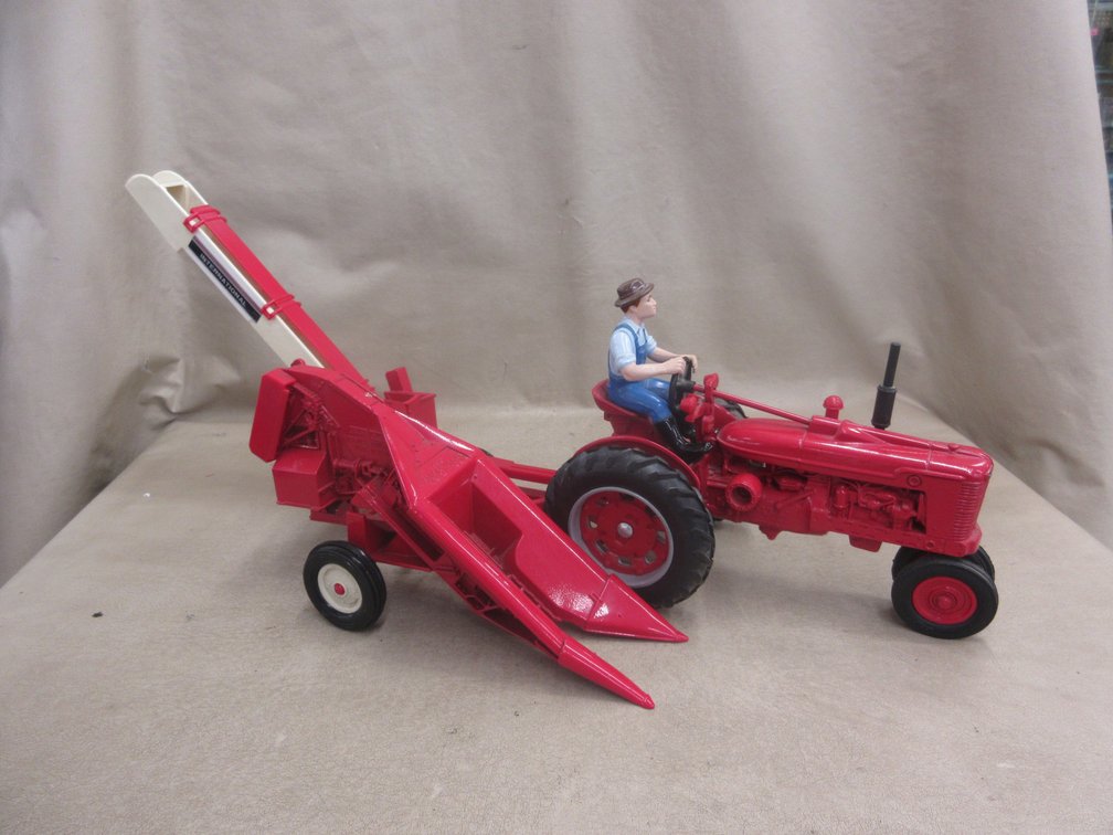 Ertl Special Edition die cast Farmall tractor and vintage corn picker