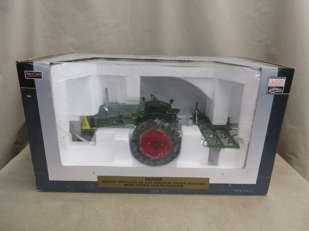 Spec Cast die cast Oliver 88 gas tractor with harrow
