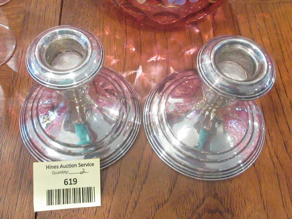 Pair of sterling weighted candlesticks