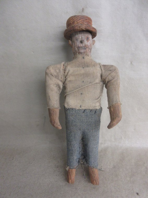 Primitive wood doll