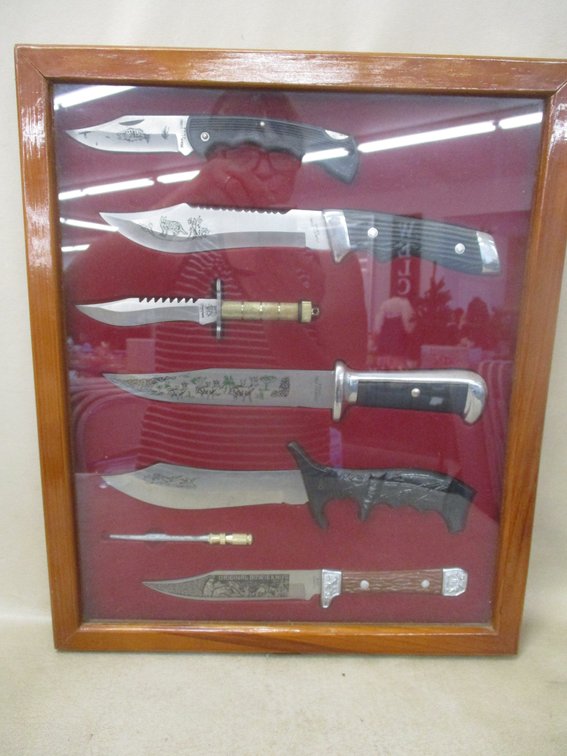 15.5"W wood display case with contents of (6) hunting knives and small sharpener