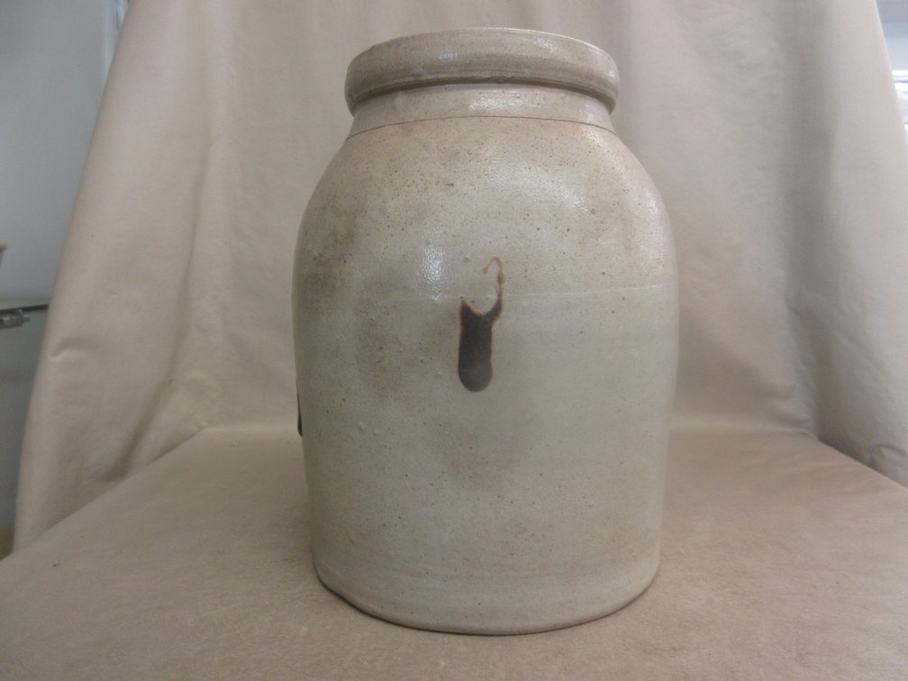Antique salt-glazed two-tone crock with turkey droppings