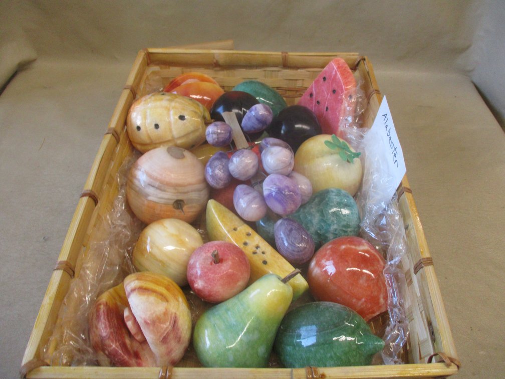 Group of Alabaster fruit in basket