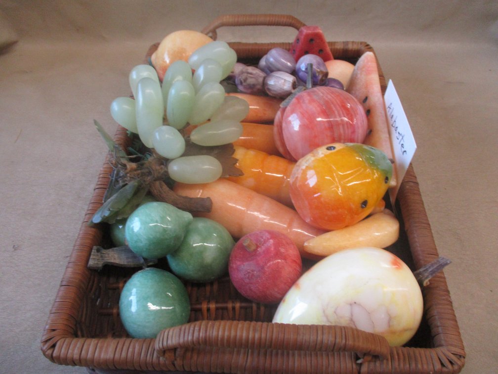 Group of Alabaster fruit in basket
