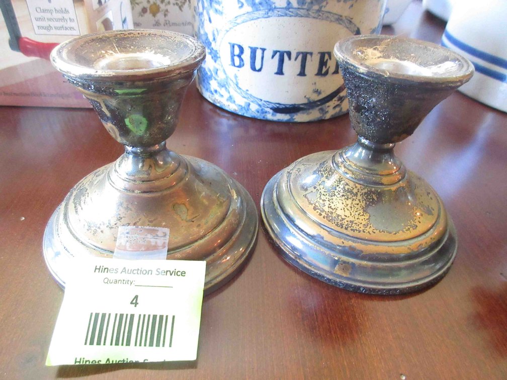Pair of sterling weighted Berkely candlesticks