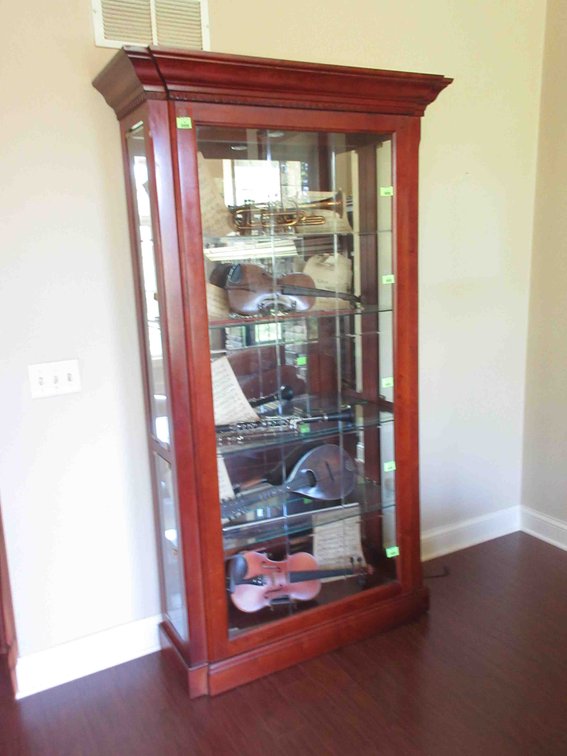 Lighted curio cabinet with side doors