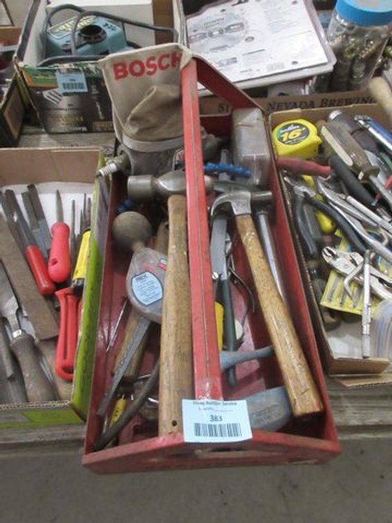 Metal tool carrier with tools