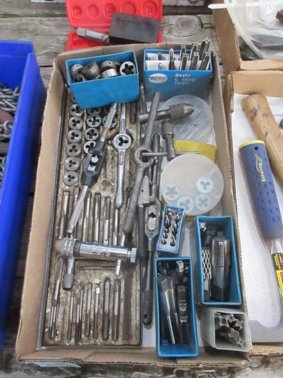 Flat of taps and dies
