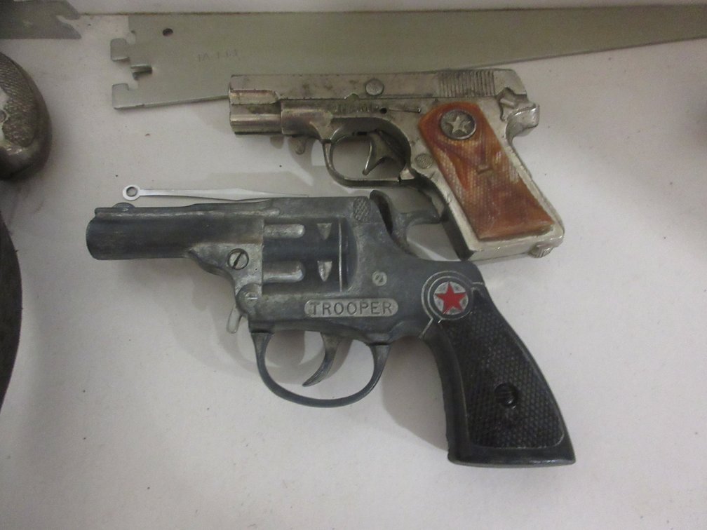 (2) Toy cap guns