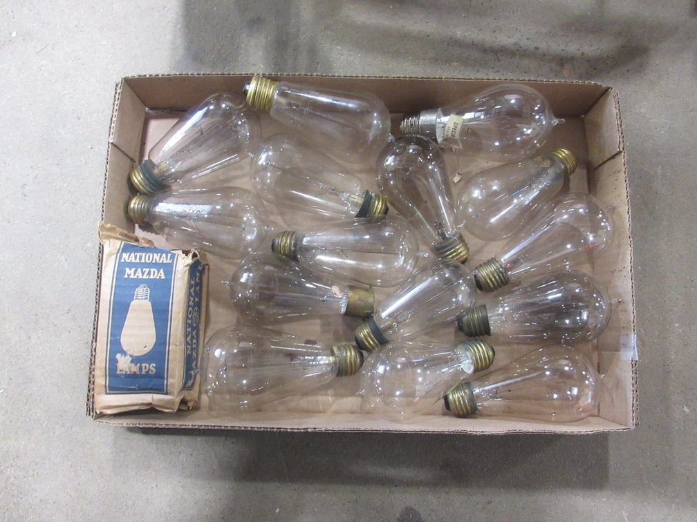 Box of vintage light bulbs including Edison Mazda
