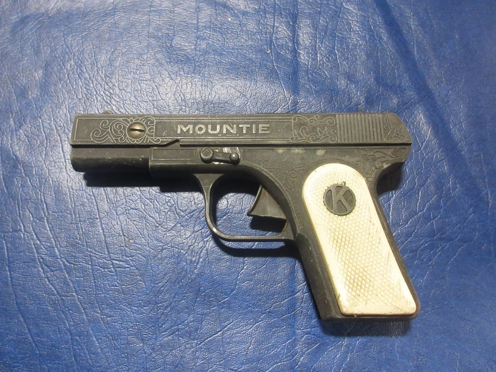 Mountie toy cap gun