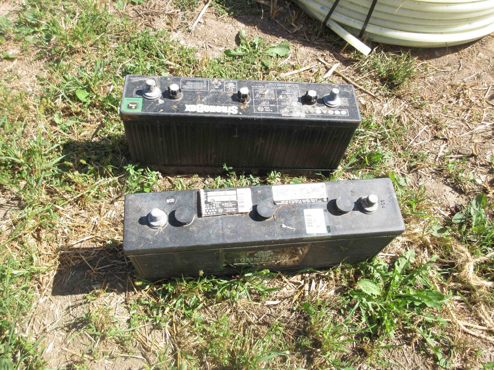(2) Used tractor batteries