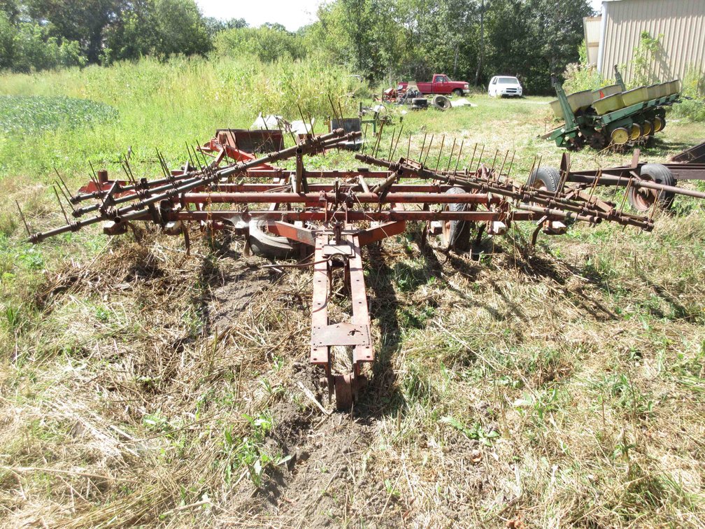 International 11'W spring tooth cultivator