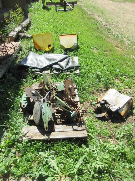 Group of John Deere planter parts