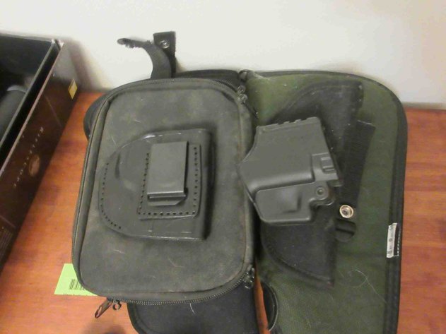 Image for Group of pistol holsters and soft cases