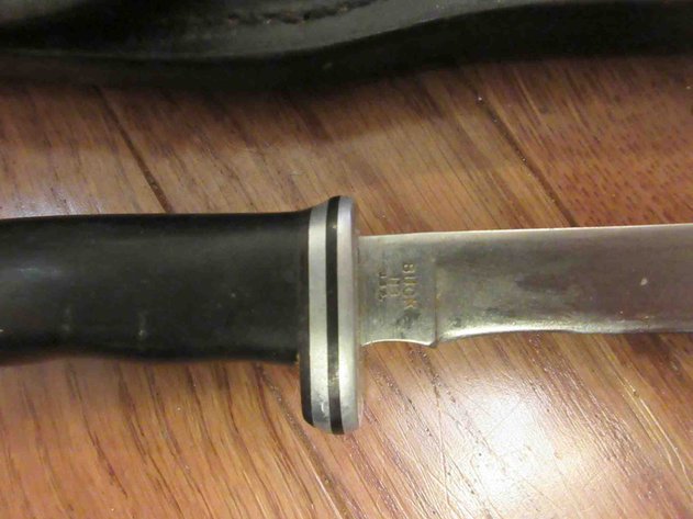 Image for Buck knife in leather sheath