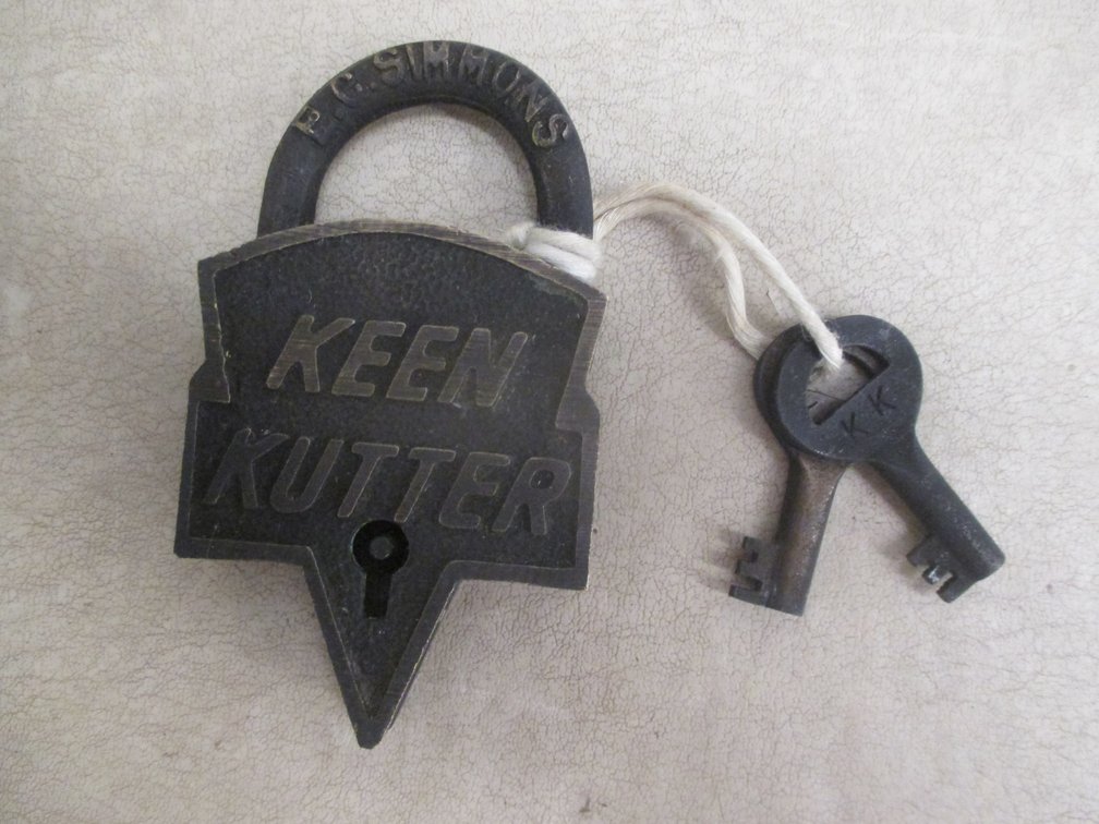 E.C. Simmons Keen Kutter brass lock made into a belt buckle