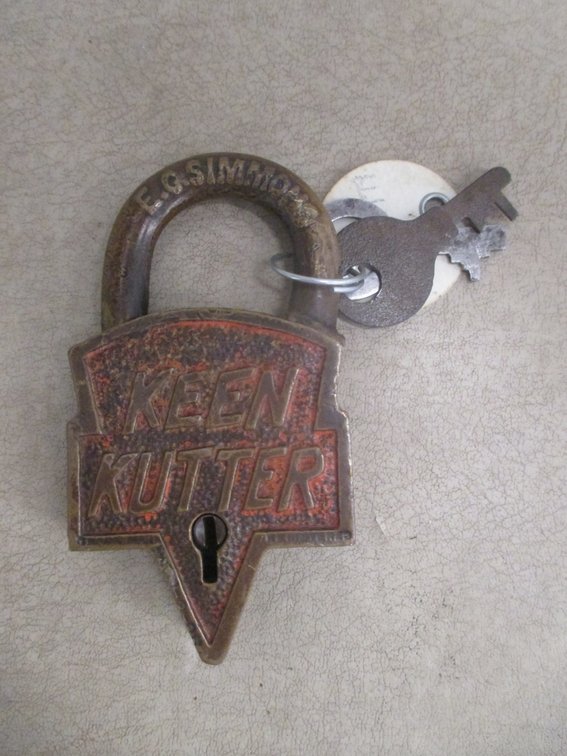 E.C. Simmons Keen Kutter brass lock made into a belt buckle