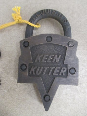 Image for E.C. Simmons Keen Kutter brass lock made into a belt buckle