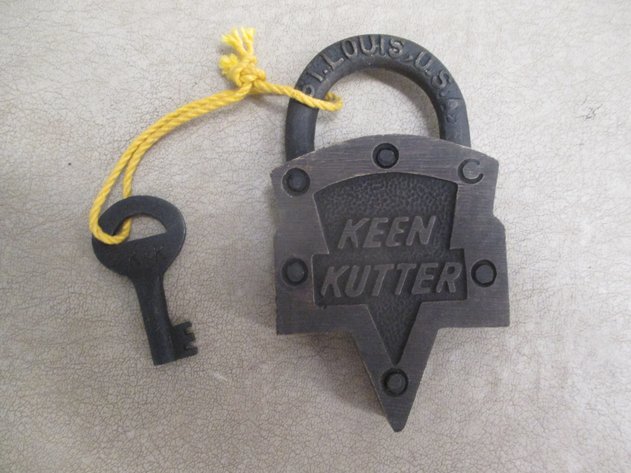 Image for E.C. Simmons Keen Kutter brass lock made into a belt buckle