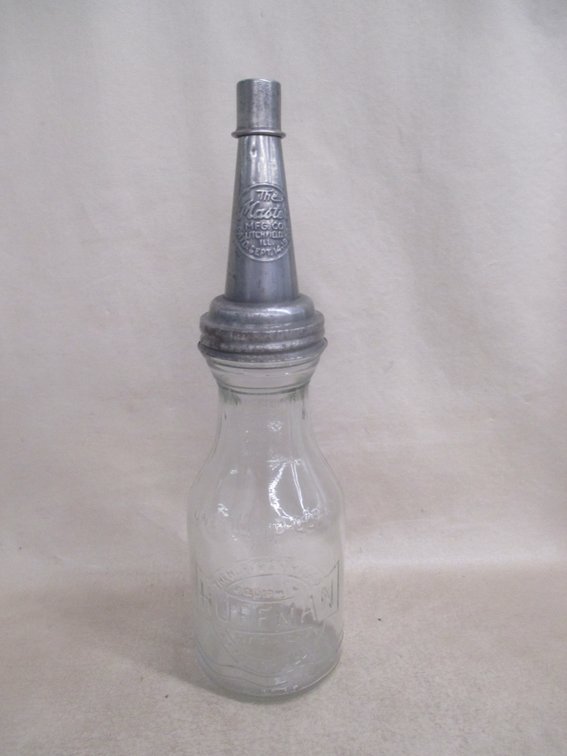 Huffman embossed glass one-quart oil bottle with Master embossed pour spout lid