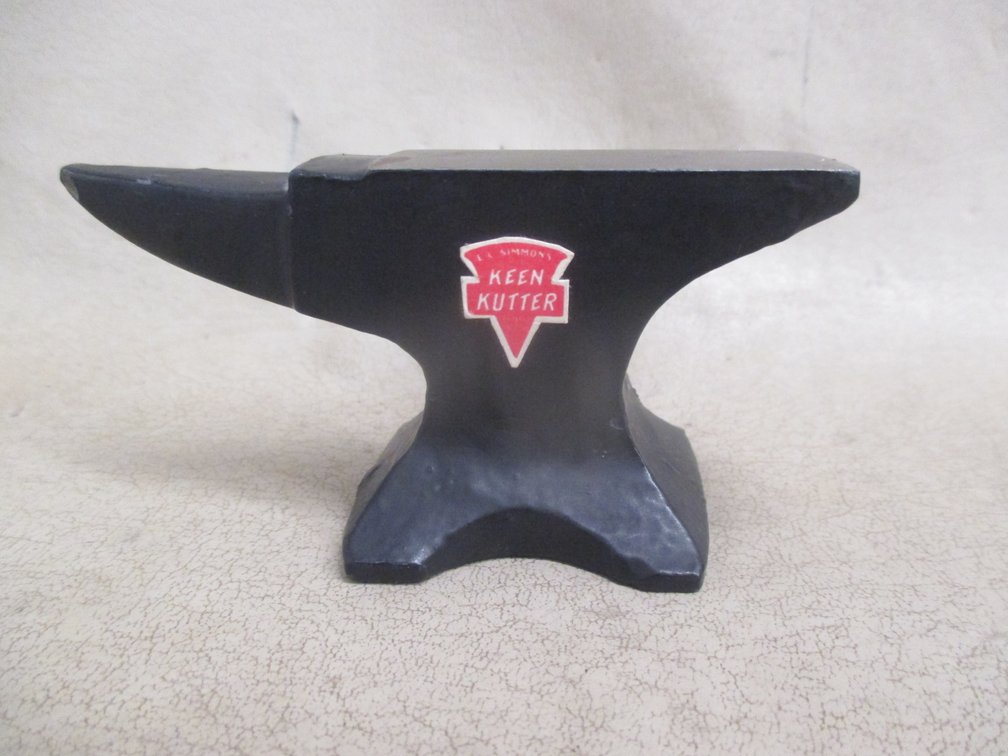 Keen Kutter anvil paper weight