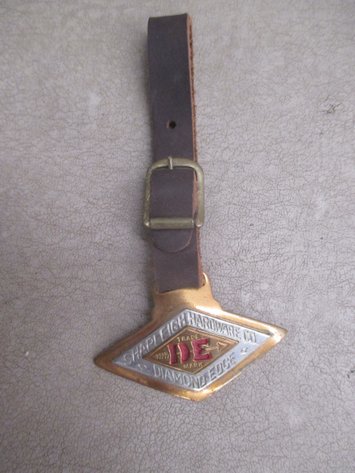 Image for Sharpleigh Hardware Co Diamond Edge watch fob on leather