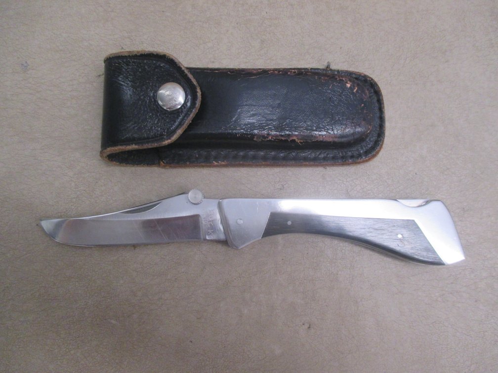 Hand made stainless steel folding knife
