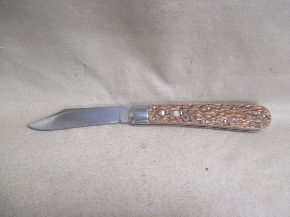 Remington R2403 folding with a safety and button