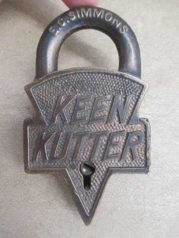 Image for E.C. Simmons Keen Kutter brass lock made into a belt buckle