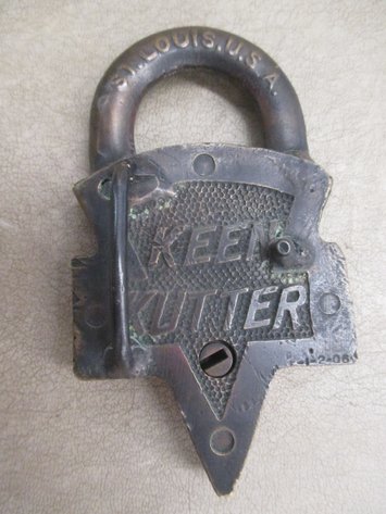Image for E.C. Simmons Keen Kutter brass lock made into a belt buckle