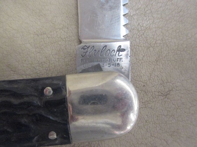 Image for Flylock folding knife with button