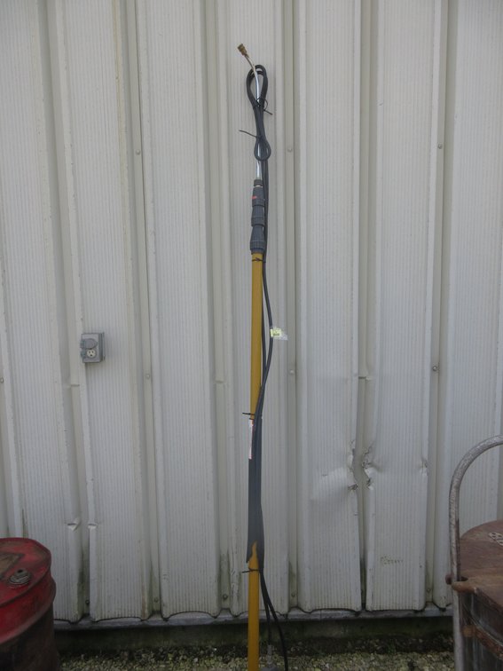 Extending arm pressure washer wand