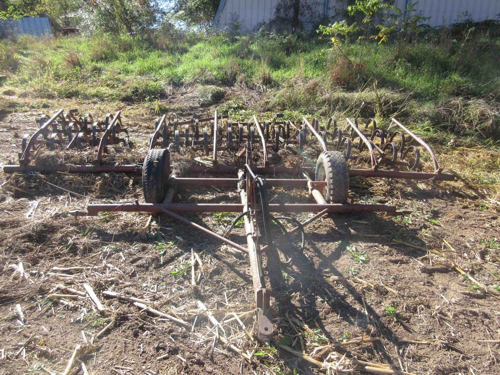 4-Section spring tooth drag with rear drag bars