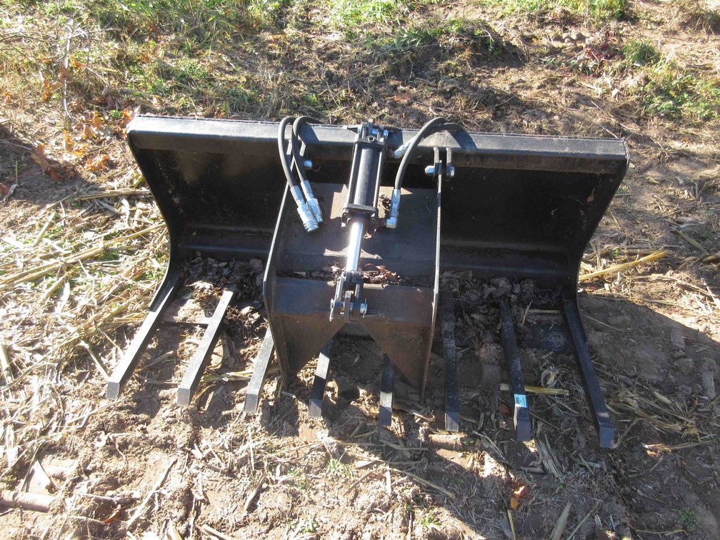 Skid steer hydraulic grapple fork