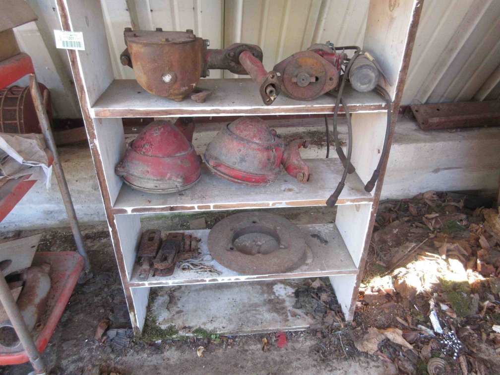(3) Shelves of tractor parts