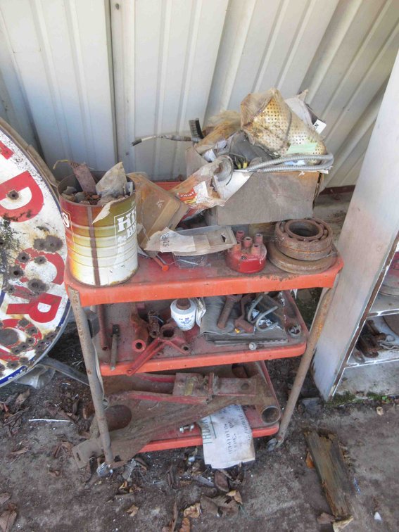 Metal cart with tractor parts