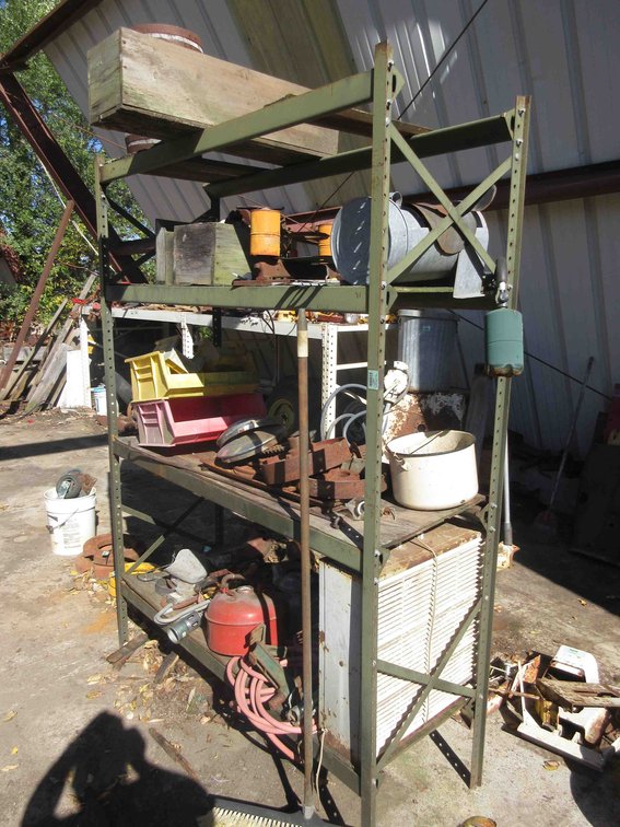 Metal shelf unit with contents