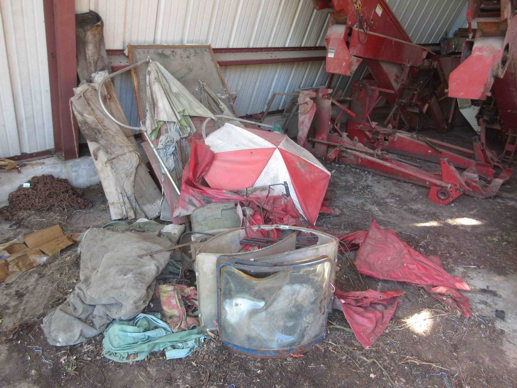 Group of tractor cab parts and umbrella
