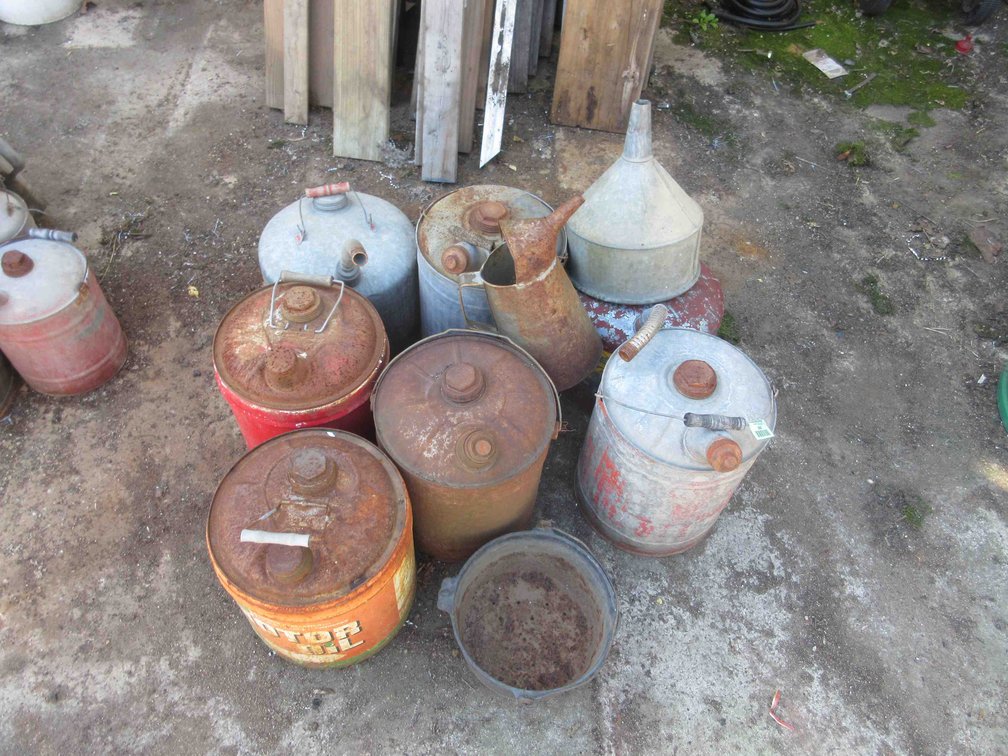 Group of shop cans and funnel