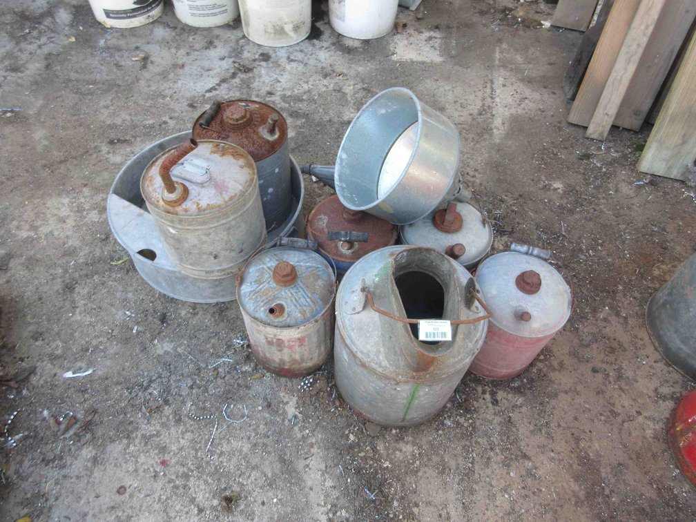 Group of shop cans and funnel
