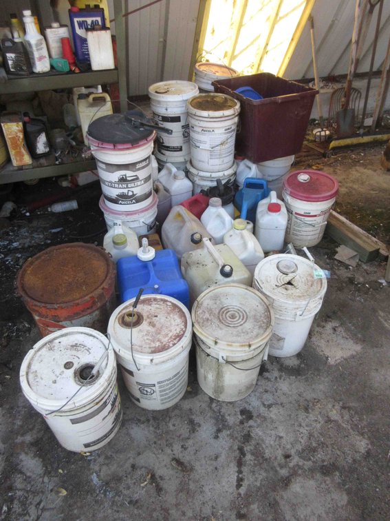 Group of pails and shop fluids