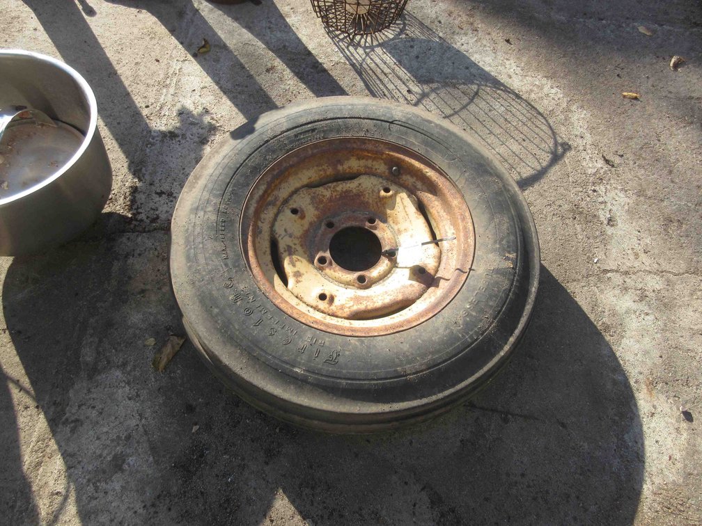 Implement tire on rim