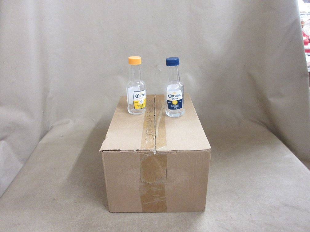 (12) Pair of Corona Extra glass bottle shakers