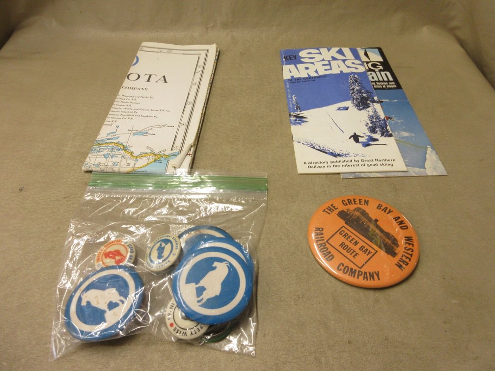 Group of Great Northern Railway pinback buttons and maps