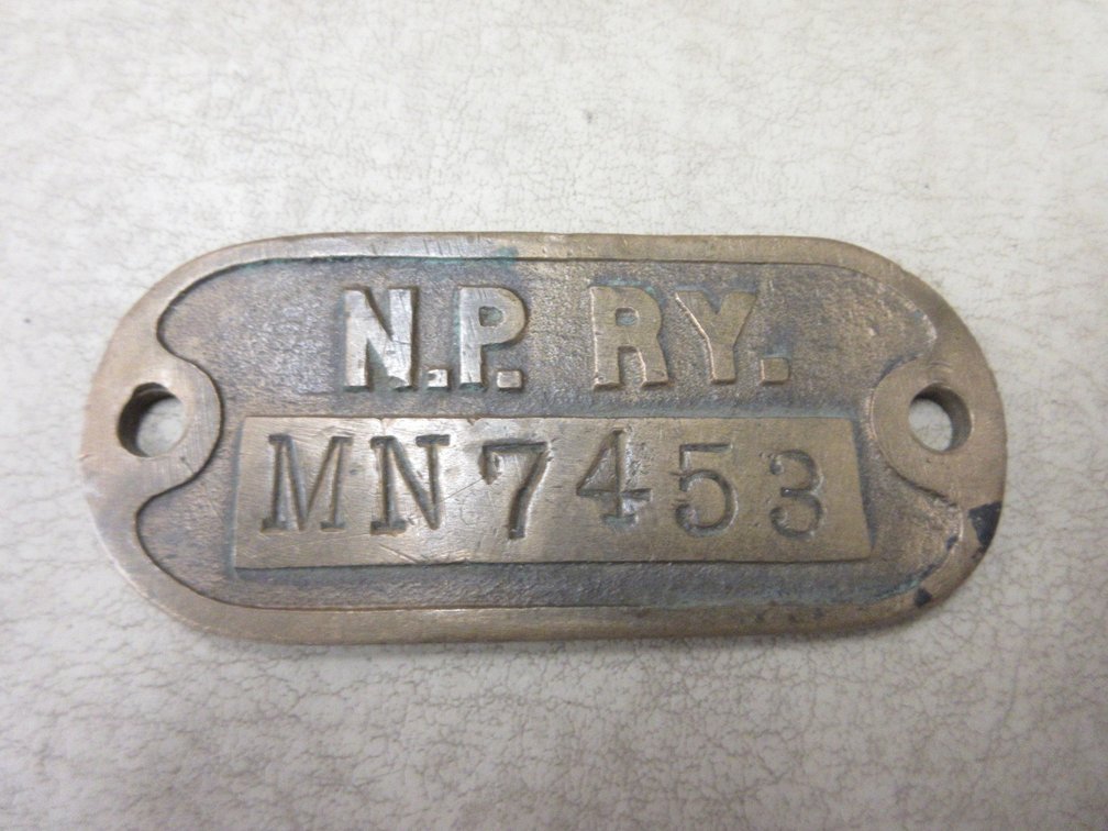 N.P.RY. Brass tag
