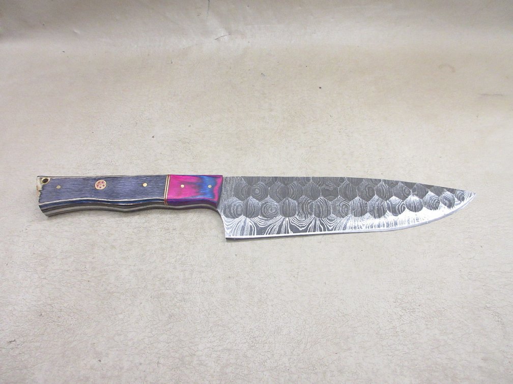 Custom Damascus stationary blade knife