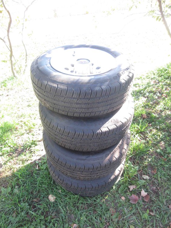 Set of (4) BF Goodrich tires on 5-bolt rims