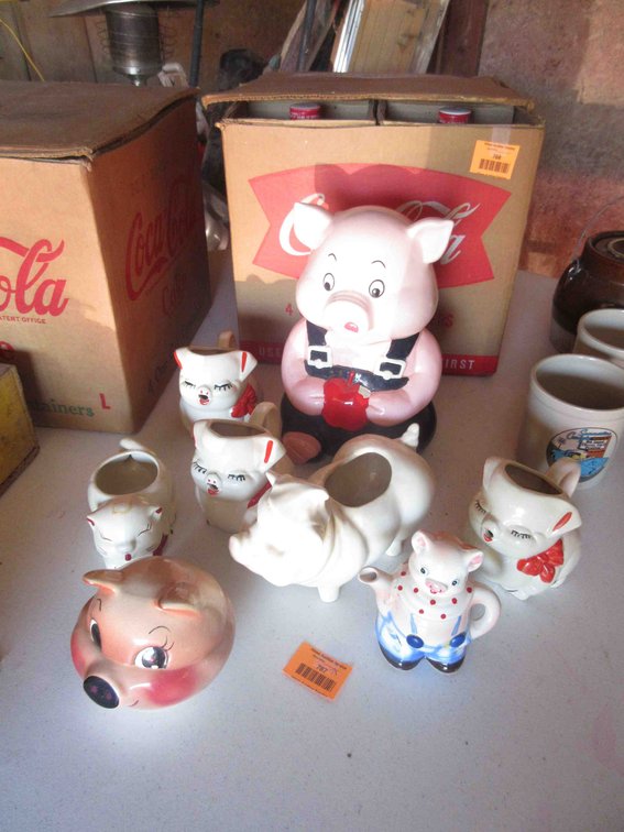 Group of pig creamers and cookie jar
