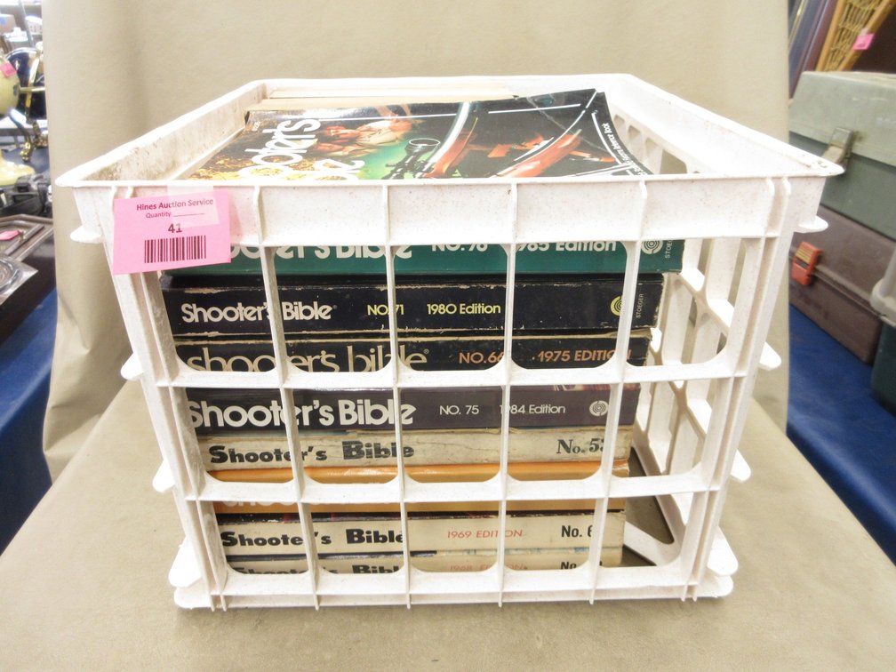 Plastic crate of firearms books
